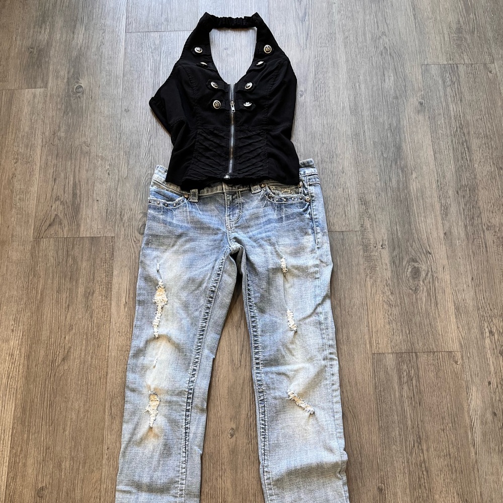 Harley Davidson distressed ripped low rise jeans. Gem and stud details.